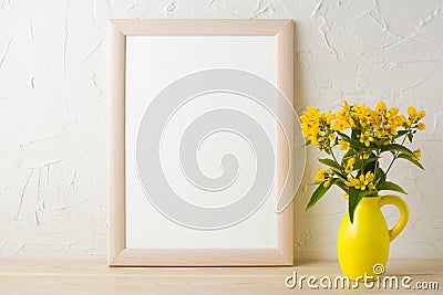 Frame mockup with yellow flowers in stylized pitcher vase Stock Photo