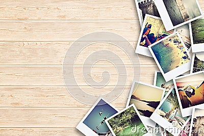 Frame with old paper and photos on wooden background. Stock Photo