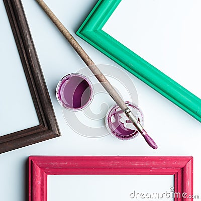 Frame, painbrushe and acrilic paint. Stock Photo