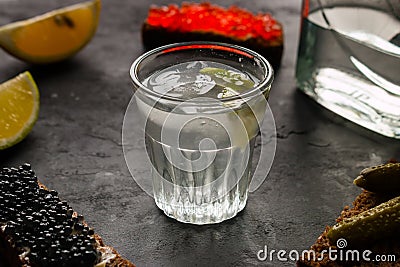 Frame of snacks and a glass of vodka Stock Photo