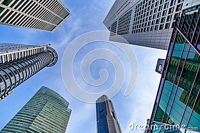 Frame, view look up to high office buildings, skyscrapers, architectures in financial area. Smart modern city urban landscape Stock Photo