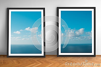 Framed picture prints of ocean and blue sky landscape photography on wooden floor Stock Photo