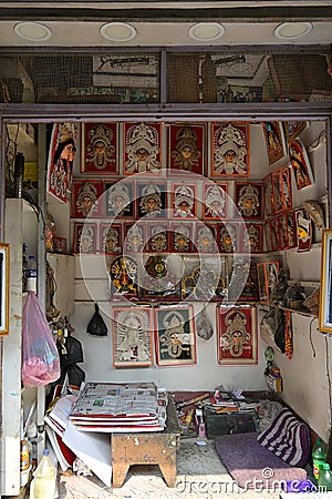 Framed pratima of Hindu Goddess Durga for sale at an artisan's stall in Kumartili, Kolkata Editorial Stock Photo