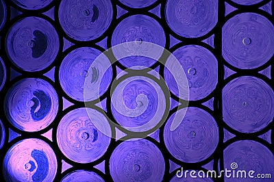 Framed violet-blue stained-glass window Stock Photo