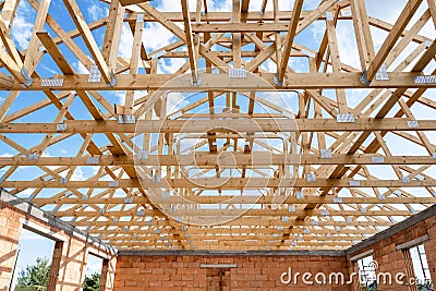 Framework roof with wooden joist, support beams Stock Photo