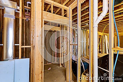 Framing home unfinished wood frame building or a house Stock Photo