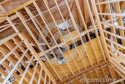 Framing home unfinished wood frame building or a house Stock Photo