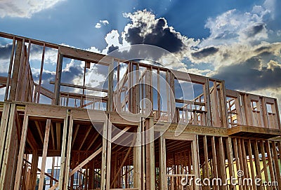 Framing home unfinished wood frame building or a house Stock Photo