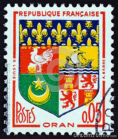 FRANCE - CIRCA 1960: A stamp printed in France from the `Arms of French Towns` issue shows Oran coat of arms, circa 1960. Editorial Stock Photo