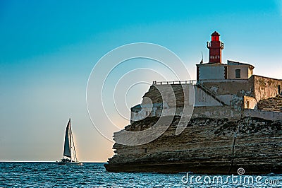 France. Corsica. Bonifacio. Madonetta lighthouse at the exit of the port Stock Photo