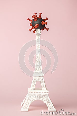 France fighting against covid-19 virus abstract made of coronavirus symbol and Eiffel Tower model Stock Photo
