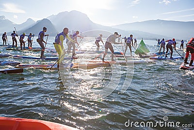 19.01.2019 - France Lake Annecy GlaGla Race 2019. SUP racers are participating in sport event. Lake Annecy in Franch Editorial Stock Photo