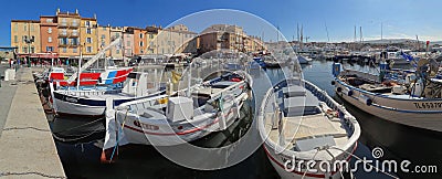 The Saint Tropez harbor and seaside esplanade Editorial Stock Photo