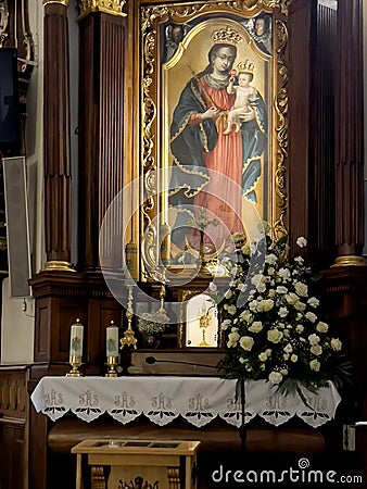 Franciscan Monastery of the Reformers in Wejherowo, Poland. Interior view. The altar with the image of Our Lady of Wejherowo Editorial Stock Photo