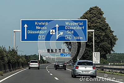 Frankfurt, Germany 29.09.2017 - German highway autobahn blue road sign leading to the airport duesseldorf Editorial Stock Photo