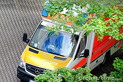 Frankfurt, Germany - June 2021: modern white ambulance car with flashing lights on roof at top is waiting for the patient, medics Editorial Stock Photo