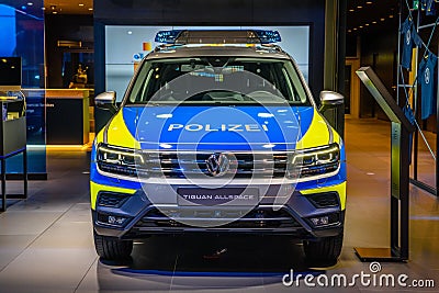 FRANKFURT, GERMANY - SEPT 2019: blue yellow police VOLKSWAGEN VW TIGUAN 2nd generation 5N SUV, IAA International Motor Show Auto Editorial Stock Photo