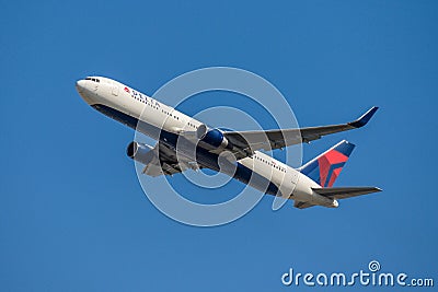 FRANKFURT GERMANY 11.08.2019 USA Delta AIRLINES Boeing 767-332 approaching to fraport airport on Blue sky N177DN Editorial Stock Photo