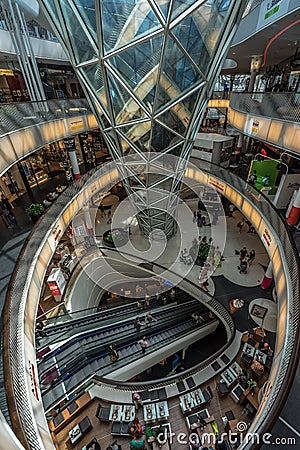 People walking inside Myzeil shopping mall. Futuristic architecture Myzeil shoping center building was Editorial Stock Photo