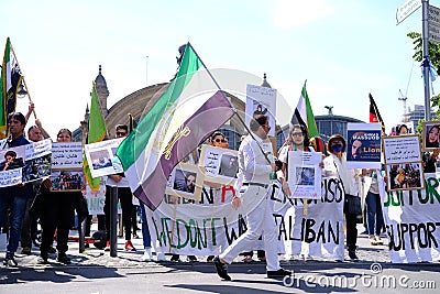 Frankfurt - June 2022: participants of international Afghan movement against the Taliban, rally in city with posters, flags, a Editorial Stock Photo
