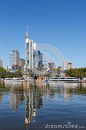 Frankfurt skyline with Main river and Eiserner Steg Bridge travel traveling portrait format in Germany Stock Photo