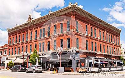 Franklin, Pennsylvania, USA 7/14/20 A large three story brick building that houses businesses and retail shops Editorial Stock Photo