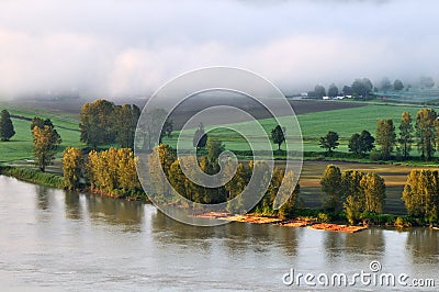 Fraser river at foggy sunrise Stock Photo