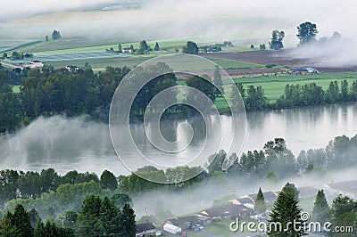 Fraser Valley at foggy sunrise Stock Photo