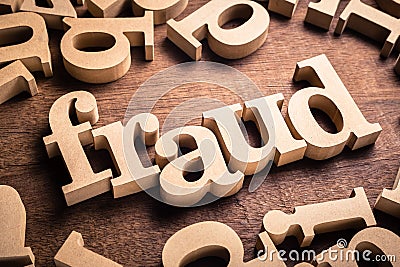 Fraud Word on Table Stock Photo