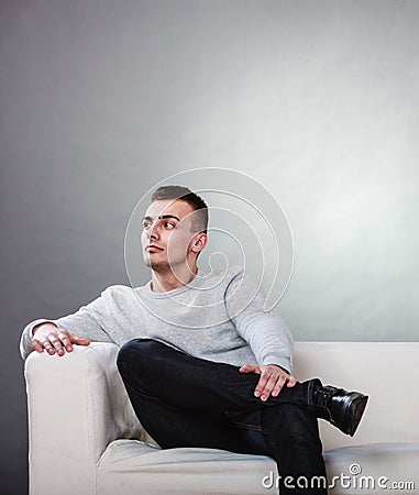Fraught, bored man husband waiting for woman wife. Stock Photo