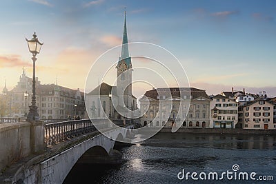 Fraumunster Church and Munsterbrucke Bridge at sunset - Zurich, Switzerland Stock Photo