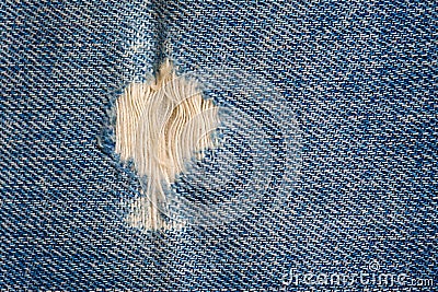 Frayed blue jeans Stock Photo