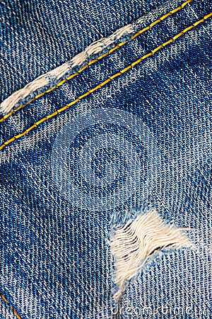 Frayed blue jeans Stock Photo