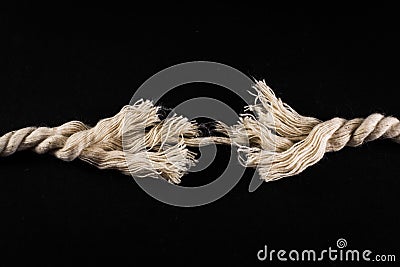 Frayed Rope and Thread on Black Background Stock Photo