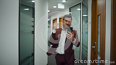 Freaked business man screaming online at coworking closeup. Manager using mobile Stock Photo