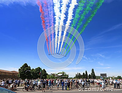Frecce Tricolore, acrobatic air force patrol of the Italian air force, evolutions with Italian tricolor smoke trails Editorial Stock Photo