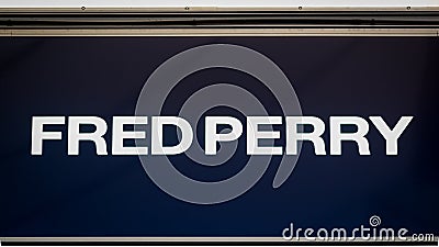 Fred Perry shop sign at Ashford Outlet Center, Kent, England, UK. Editorial Stock Photo