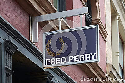 Fred Perry shop sign with golden laurel in New York Editorial Stock Photo