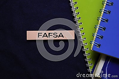 Free Application For Federal Student Aid FAFSA on sticky Notes isolated on office desk Stock Photo