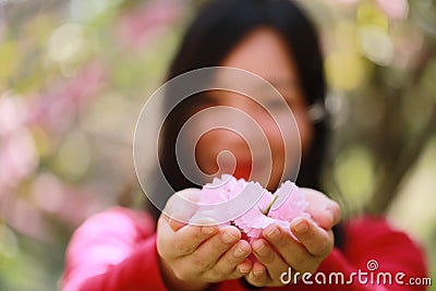 Free careless causual beauty girl with flowers in spring park enjoy free time Stock Photo