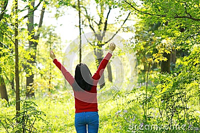 Free careless causual beauty girl hug embrace nature enjoy good time in forest park Stock Photo