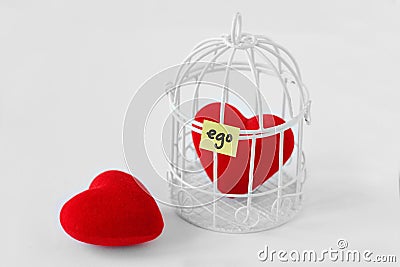 Free heart and heart in a bird cage with the word Ego written on Stock Photo