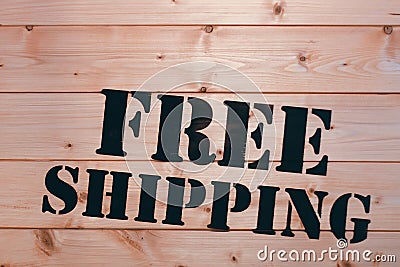 Free Shipping. Free Shipping word on wooden transport box. Free Shipping Package. Stock Photo
