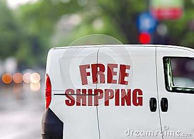 Free shipping, van on city street Stock Photo