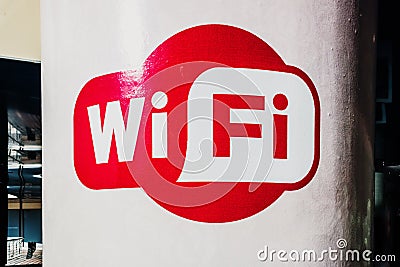 Free signal WiFi logo on a public street Editorial Stock Photo