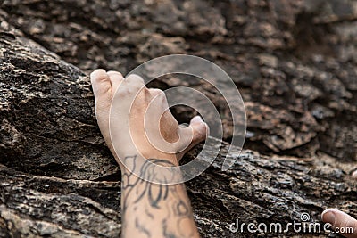 Hands of a traditional rock climber Stock Photo