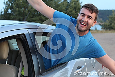 Free spirited car passenger enjoying the ride Stock Photo