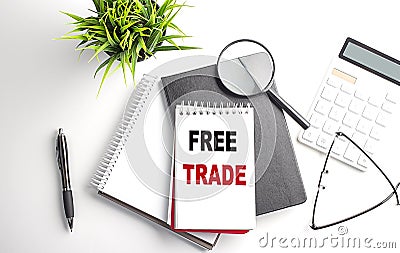 FREE TRADE text on white paper. the inscription on the notebook Stock Photo