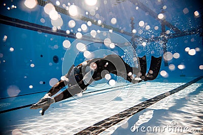 Freediver Performing during a DYN Freediving Competition Stock Photo
