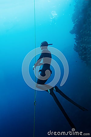 Freediver swim in the sea Stock Photo